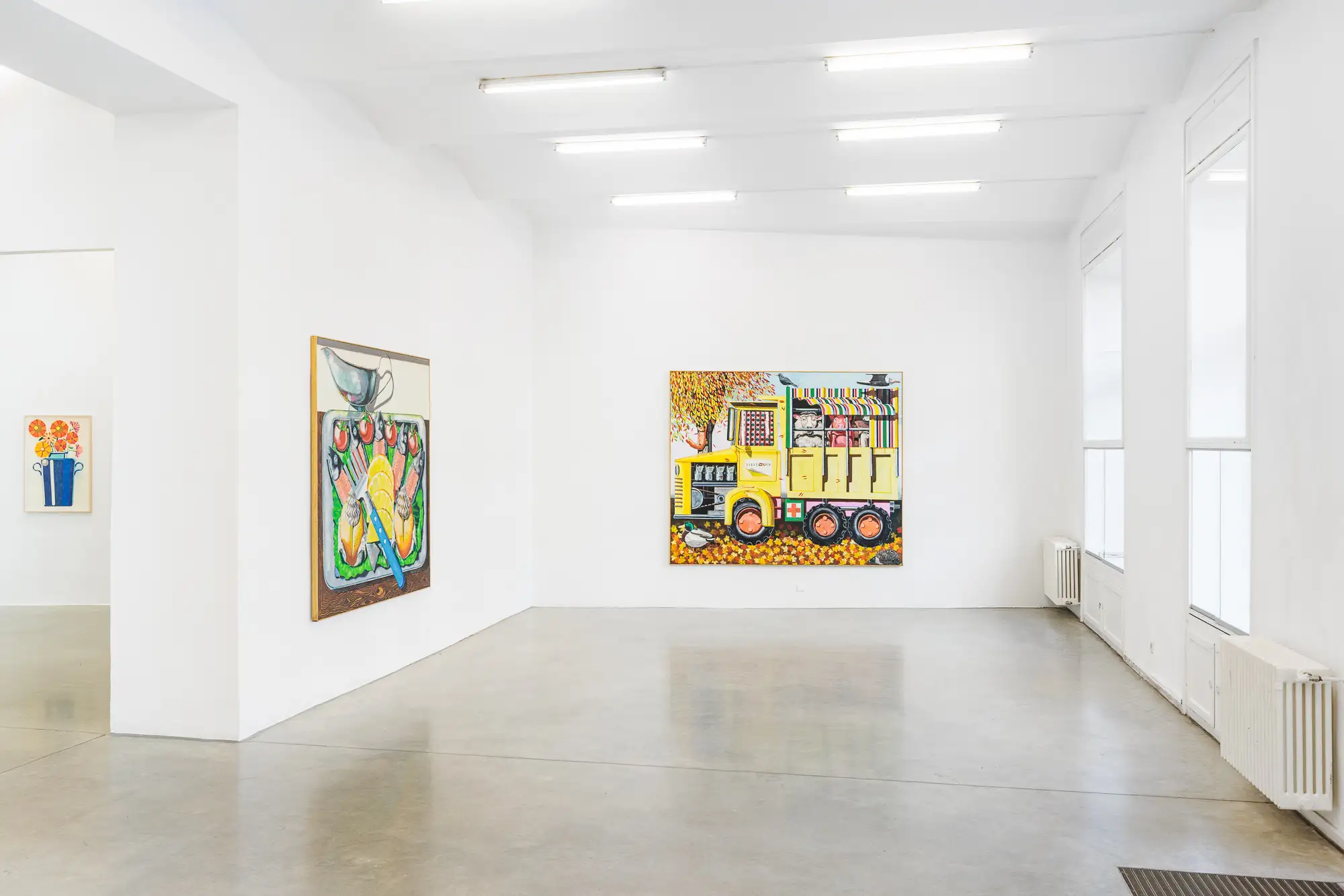 kristof santy, new face in contemporary artinterior view of the artist latest exhibition at christine könig gallery, showcasing vibrant and eclectic paintings including a large yellow truck and a colorful still life