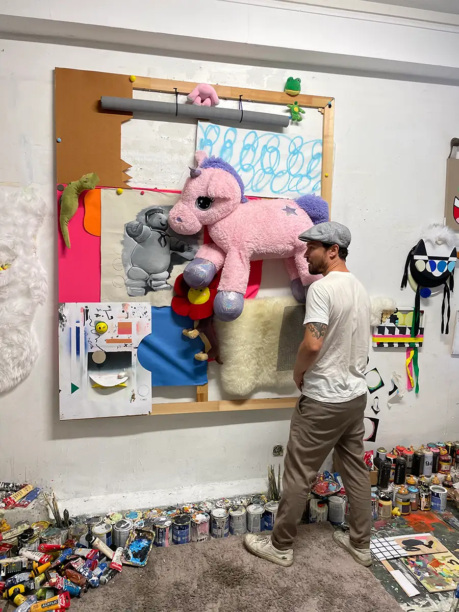 David Rosado in his studio, working on an multi layered artwork