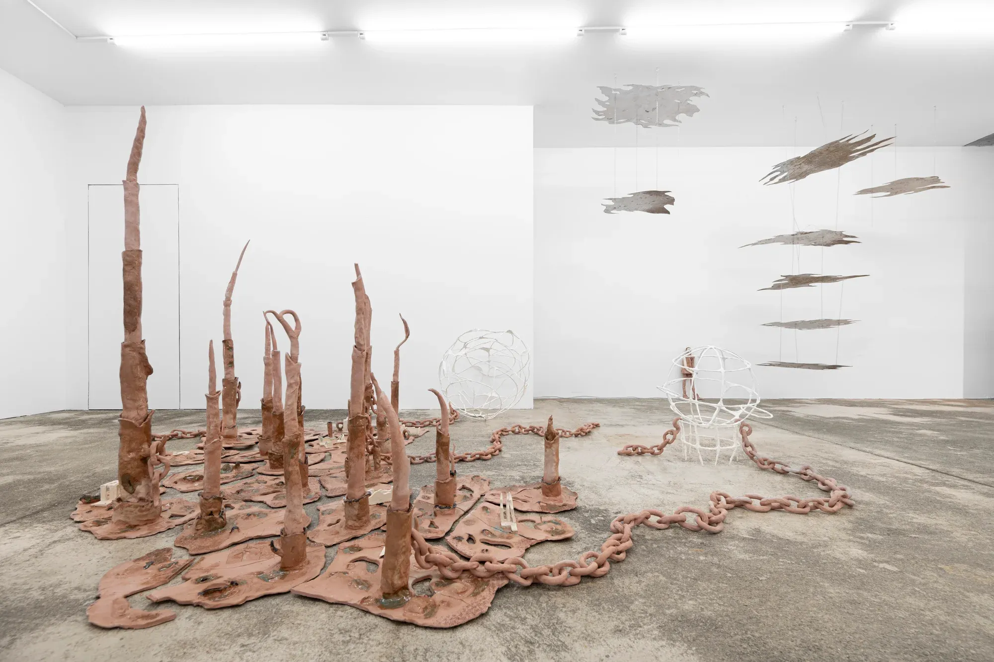 anna bochkova's floor installation at tomas umrian contemporary with clay spires and sprawling forms