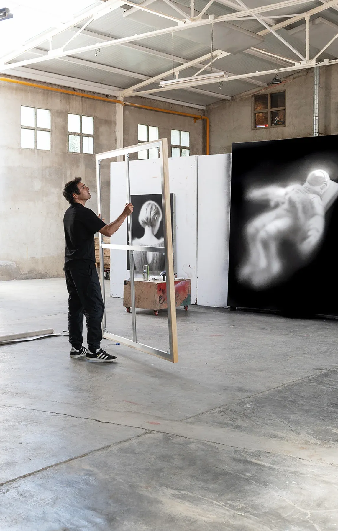 artist hugo alonso prepping his canvases for alzueta artist residency at empordà, costa brava | image courtesy of the artist